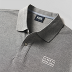 Polo brodé « I Don't Work Here Geek »