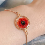 Bracelet Poppy : Pendentif en résine dorée